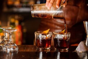 bartender pouring drinks