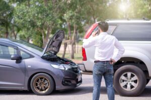 man on phone after wreck